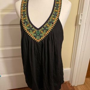 Black sleeveless with embroidered trim. Bra Tops